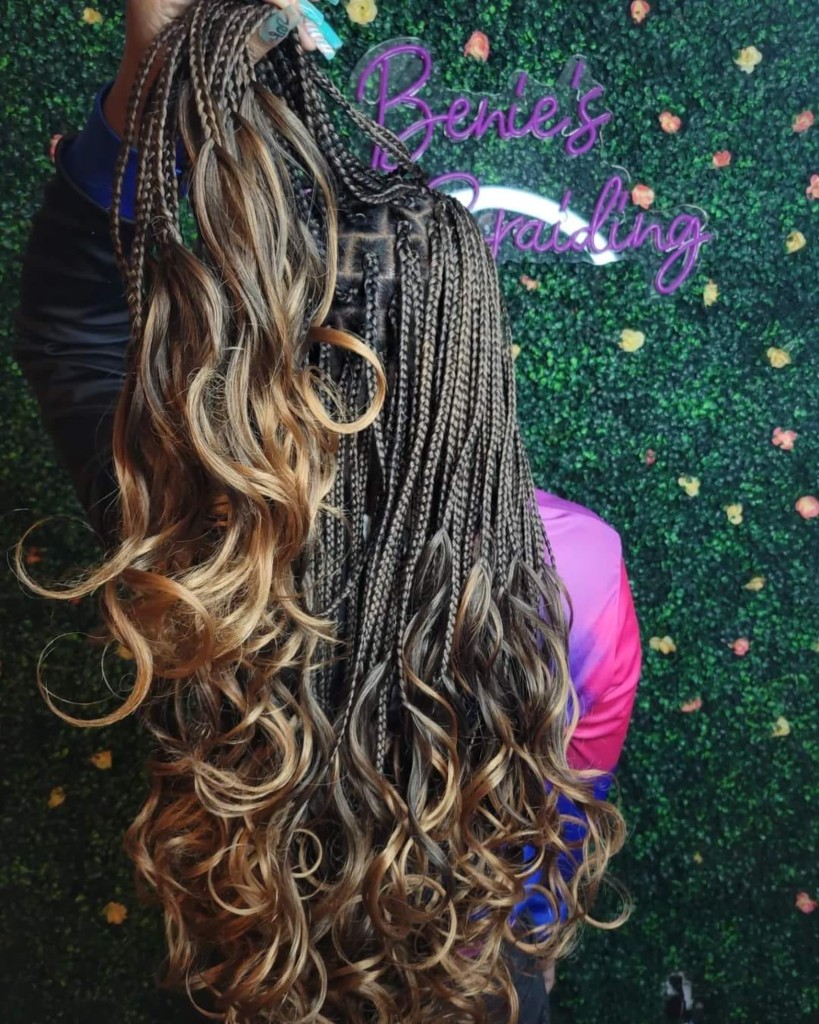 Long boho knotless box braids with curls and ombré